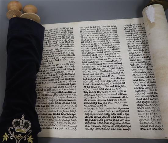 Two Torah scrolls, one on parchment